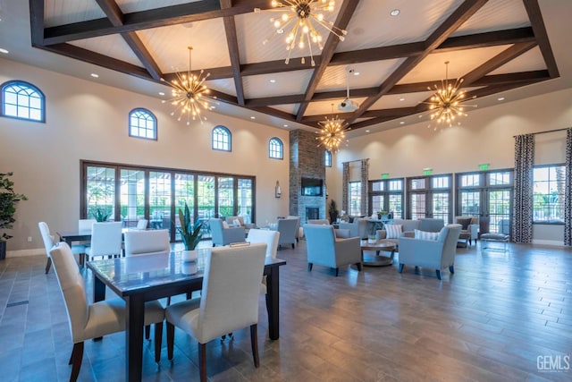 13620 Stonethwaite Ln, Bakersfield, CA 93311 - dining space featuring a chandelier, a towering ceiling, beamed ceiling, plenty of natural light, and coffered ceiling