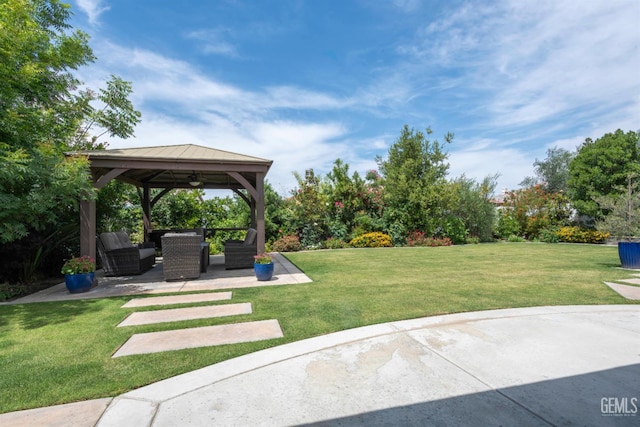 13620 Stonethwaite Ln, Bakersfield, CA 93311 - view of grassy yard featuring a gazebo, a patio area, and an outdoor hangout area
