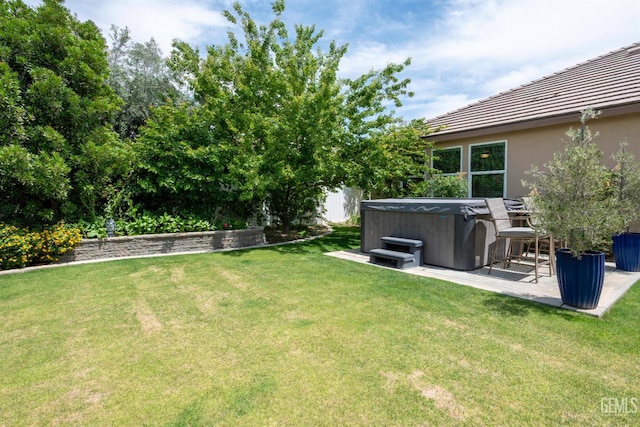13620 Stonethwaite Ln, Bakersfield, CA 93311 - view of green lawn featuring a hot tub and a patio area