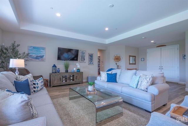 13620 Stonethwaite Ln, Bakersfield, CA 93311 - living area with wood finished floors, recessed lighting, and a raised ceiling