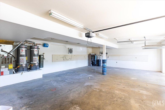 28221 Cumberland Rd, Tehachapi, CA 93561 - garage featuring water heater and a garage door opener