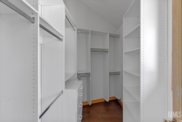28221 Cumberland Rd, Tehachapi, CA 93561 - walk in closet featuring dark wood-style floors and lofted ceiling