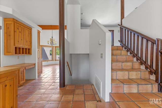 28221 Cumberland Rd, Tehachapi, CA 93561 - stairway with a chandelier