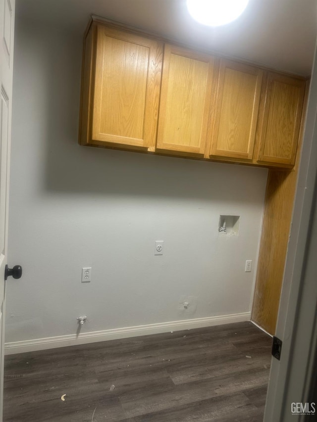 1225 Austin St, Delano, CA 93215 - laundry area with gas dryer hookup, cabinet space, dark wood finished floors, hookup for a washing machine, and electric dryer hookup