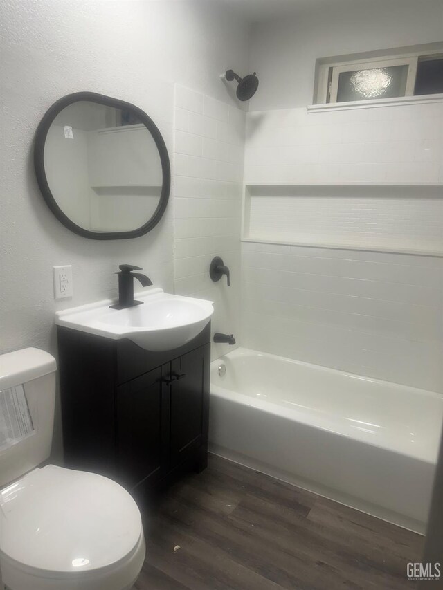 1225 Austin St, Delano, CA 93215 - full bathroom with vanity, shower / tub combination, and wood finished floors