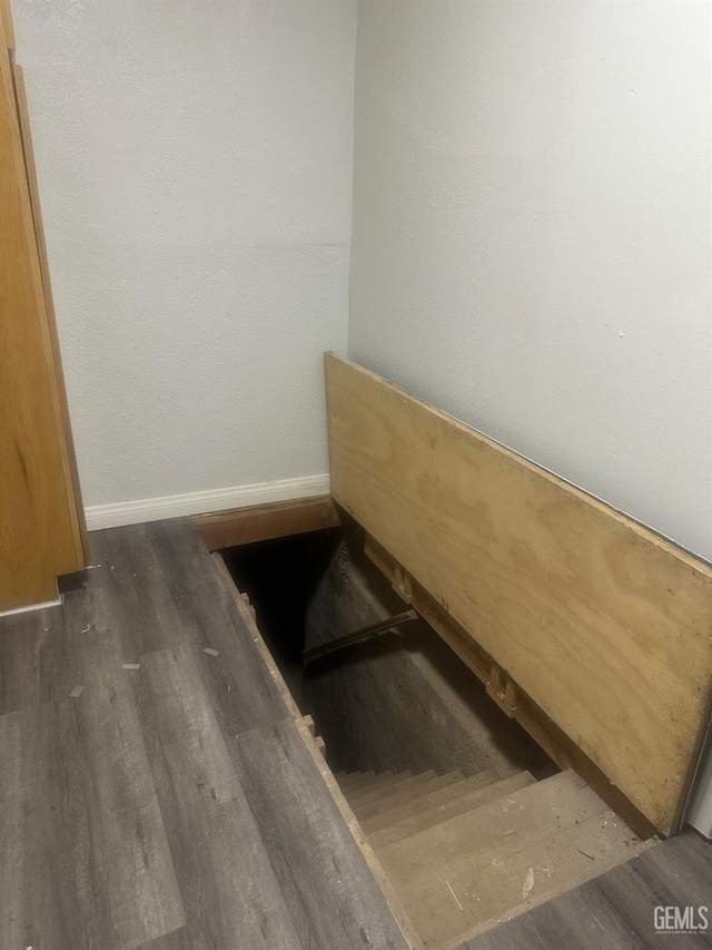 1225 Austin St, Delano, CA 93215 - staircase featuring wood finished floors