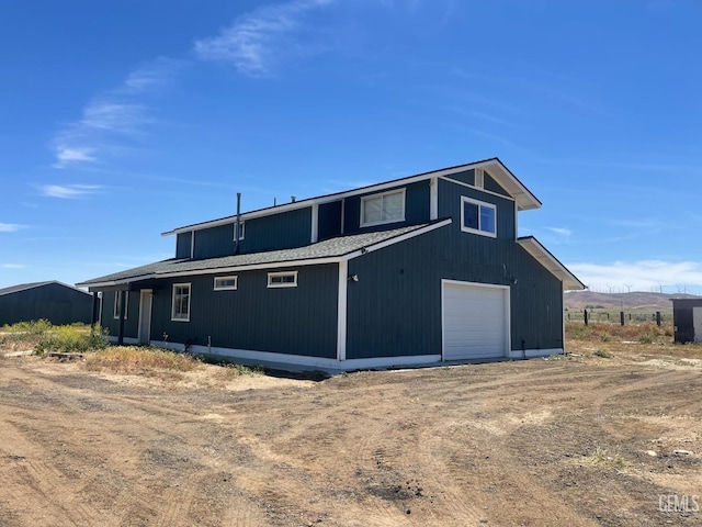 exterior space featuring a garage