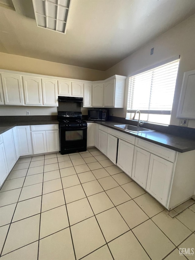 kitchen with black appliances, white cabinetry, sink, and light tile patterned floors