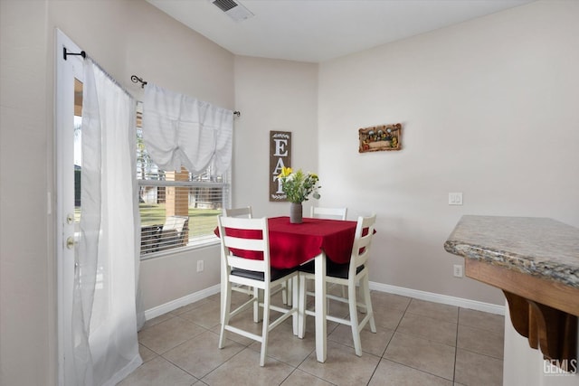 view of tiled dining space