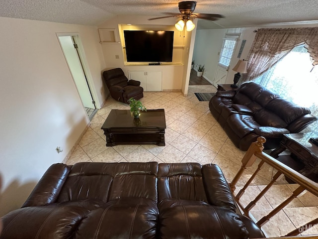 1022 9th Ave, Delano, CA 93215 - tiled living area with a textured ceiling and a ceiling fan