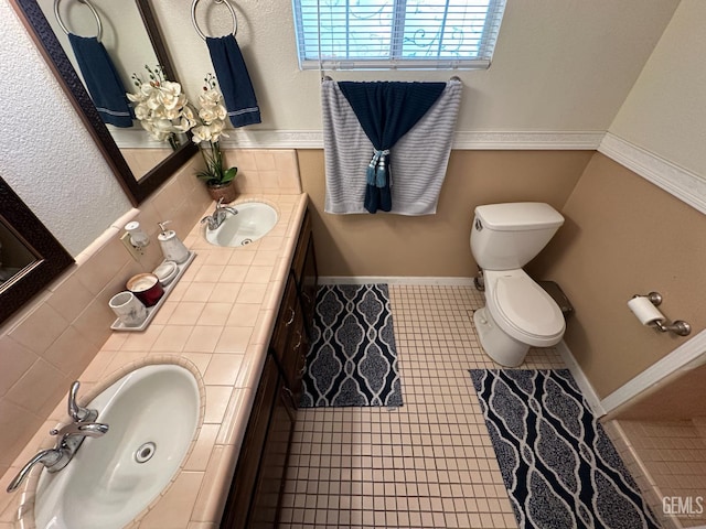 1022 9th Ave, Delano, CA 93215 - bathroom featuring double vanity and tile patterned flooring