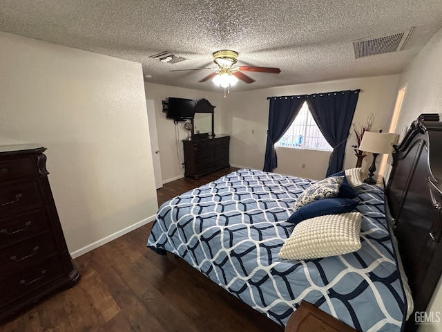 1022 9th Ave, Delano, CA 93215 - bedroom featuring wood finished floors, a textured ceiling, and ceiling fan