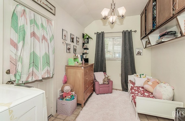bedroom featuring a chandelier and vaulted ceiling