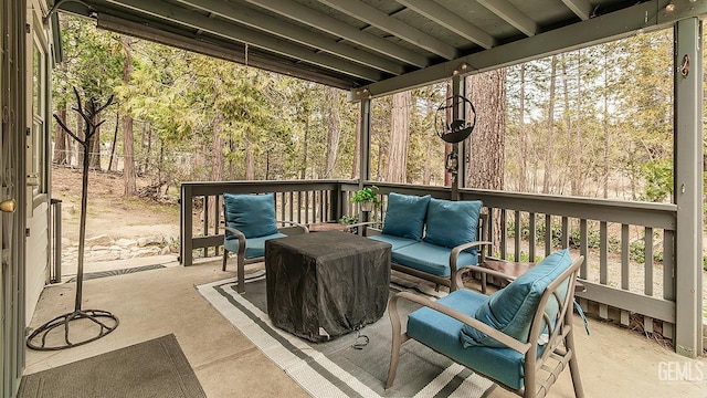 wooden deck with an outdoor hangout area