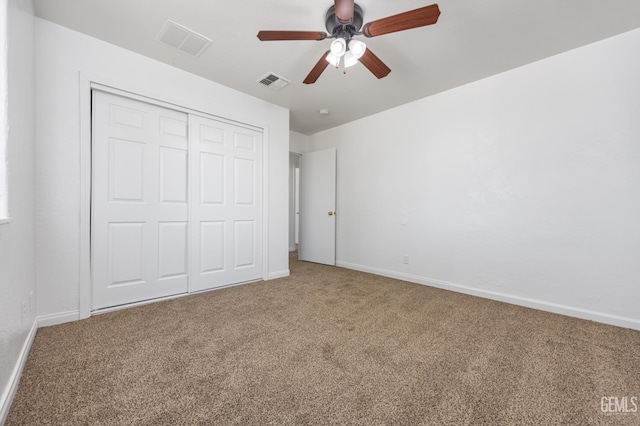 132 E Center St, Taft, CA 93268 - unfurnished bedroom featuring carpet flooring, a closet, and ceiling fan