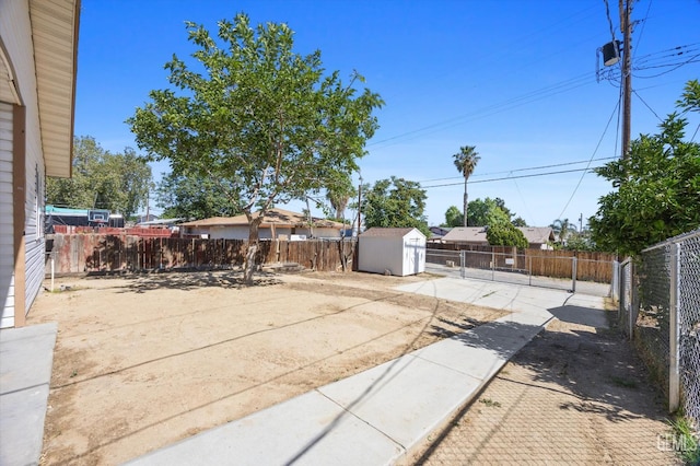 132 E Center St, Taft, CA 93268 - fenced backyard with a shed and a patio area