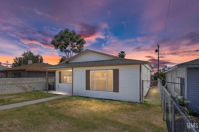 132 E Center St, Taft, CA 93268 - back of house featuring a shingled roof