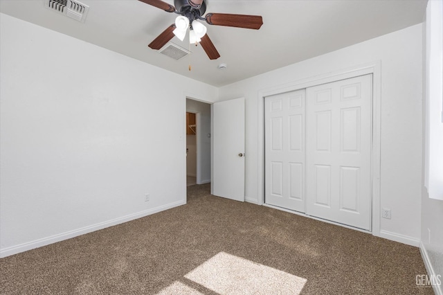 132 E Center St, Taft, CA 93268 - unfurnished bedroom with carpet, a closet, and a ceiling fan