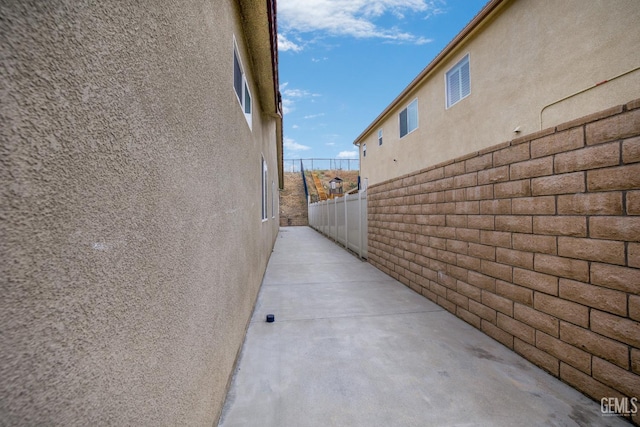 18019 Lapis Ln, San Bernardino, CA 92407 - view of side of home with stucco siding
