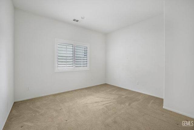 18019 Lapis Ln, San Bernardino, CA 92407 - carpeted empty room with baseboards