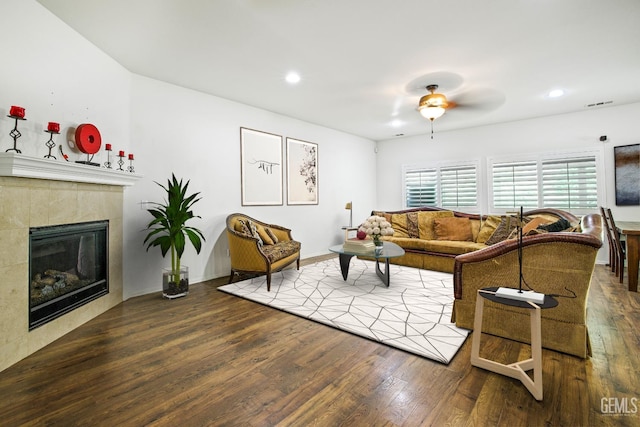 18019 Lapis Ln, San Bernardino, CA 92407 - living room with ceiling fan, wood finished floors, a tile fireplace, and recessed lighting