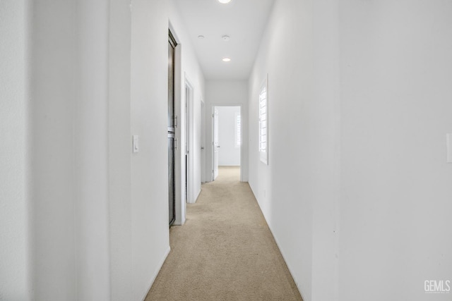 18019 Lapis Ln, San Bernardino, CA 92407 - hallway featuring light carpet and recessed lighting