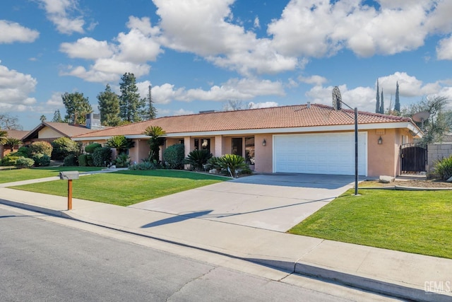 ranch-style home featuring a garage and a front yard