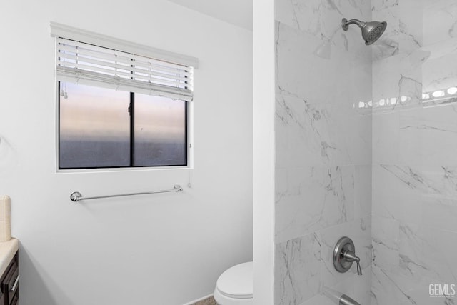 full bathroom featuring vanity, toilet, and tiled shower / bath