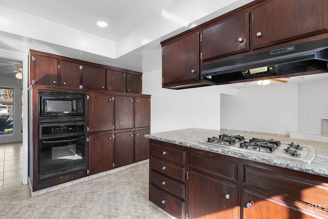 kitchen featuring black appliances and dark brown cabinetry