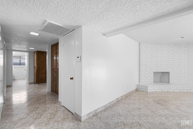 interior space featuring a textured ceiling