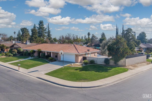 ranch-style home featuring a garage and a front yard