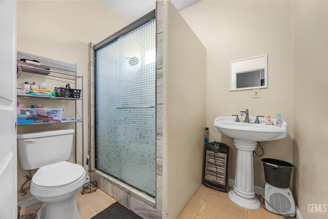2109 Via Tuscania Ave, Delano, CA 93215 - full bathroom featuring tile patterned floors, a stall shower, and toilet