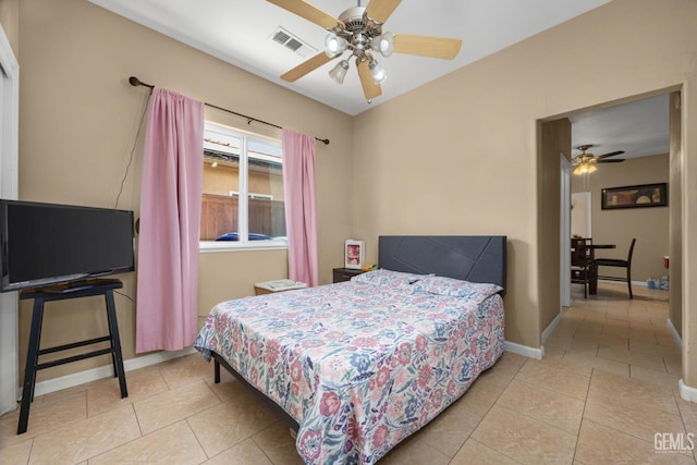 2109 Via Tuscania Ave, Delano, CA 93215 - bedroom with tile patterned flooring, baseboards, and a ceiling fan