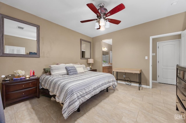 2109 Via Tuscania Ave, Delano, CA 93215 - bedroom with ceiling fan, baseboards, connected bathroom, and light tile patterned floors