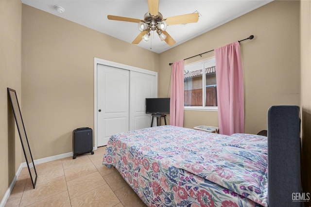 2109 Via Tuscania Ave, Delano, CA 93215 - tiled bedroom with a closet, baseboards, and a ceiling fan