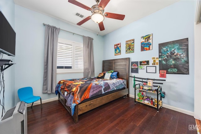 2109 Via Tuscania Ave, Delano, CA 93215 - bedroom featuring wood finished floors, baseboards, and a ceiling fan