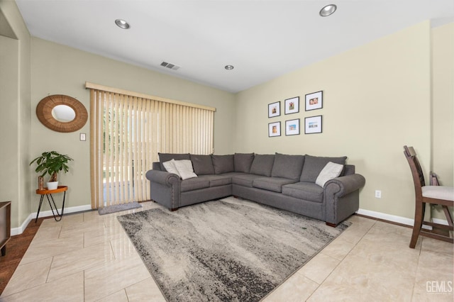 2109 Via Tuscania Ave, Delano, CA 93215 - tiled living area with recessed lighting and baseboards