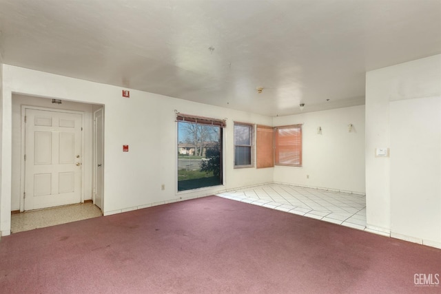 unfurnished room with carpet