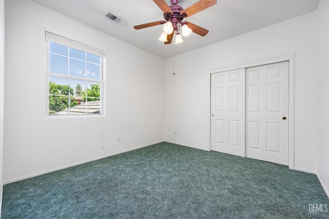 3625 Bernard St Unit 5, Bakersfield, CA 93306 - unfurnished bedroom featuring carpet flooring, baseboards, a closet, and ceiling fan