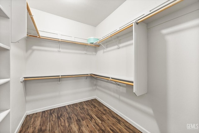 11313 Valletta Ave, Bakersfield, CA 93312 - spacious closet featuring dark wood-style floors