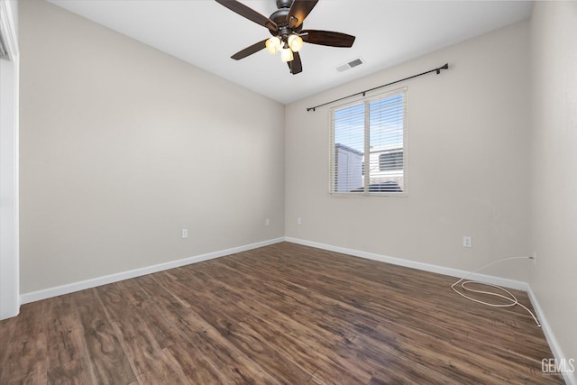 11313 Valletta Ave, Bakersfield, CA 93312 - empty room with dark wood-type flooring and ceiling fan