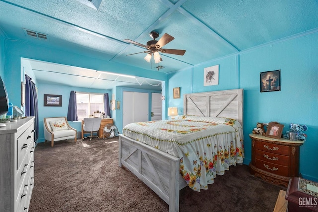 220 Tyler St, Taft, CA 93268 - bedroom with dark colored carpet, a textured ceiling, and a ceiling fan
