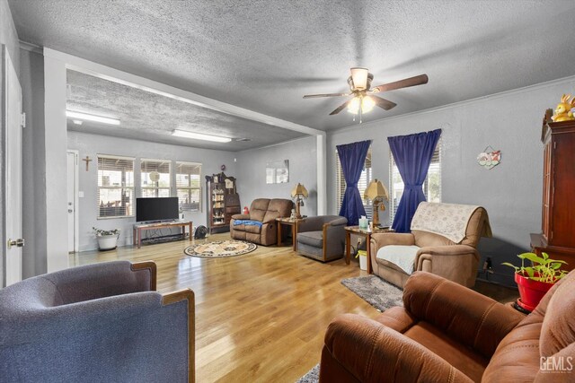 220 Tyler St, Taft, CA 93268 - living room with ceiling fan, wood finished floors, and a textured ceiling
