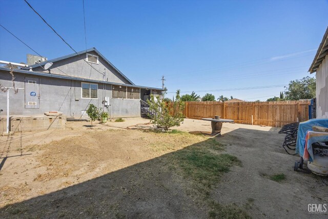 220 Tyler St, Taft, CA 93268 - view of yard featuring a sunroom