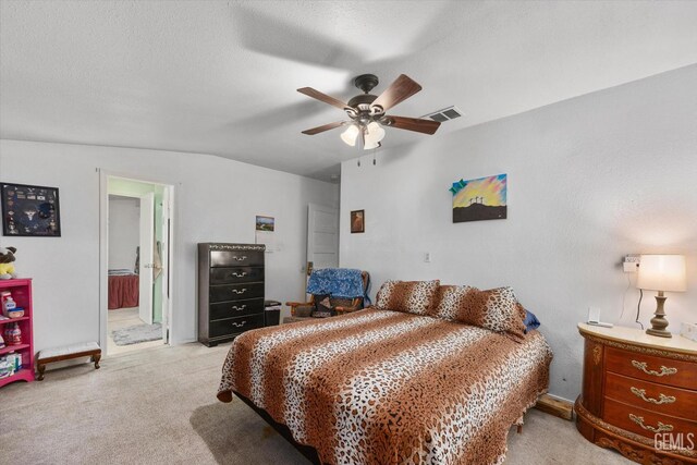 220 Tyler St, Taft, CA 93268 - bedroom featuring light carpet, lofted ceiling, ceiling fan, and ensuite bath