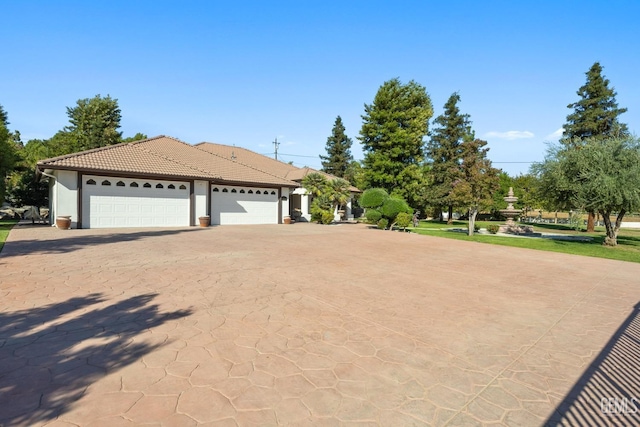 10834 Olcese Rd, Bakersfield, CA 93308 - view of front of home with a garage