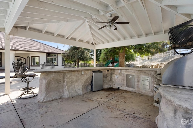 10834 Olcese Rd, Bakersfield, CA 93308 - view of patio / terrace with area for grilling, ceiling fan, and exterior bar