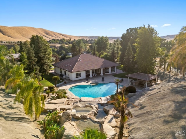 10834 Olcese Rd, Bakersfield, CA 93308 - view of swimming pool featuring a mountain view and a patio
