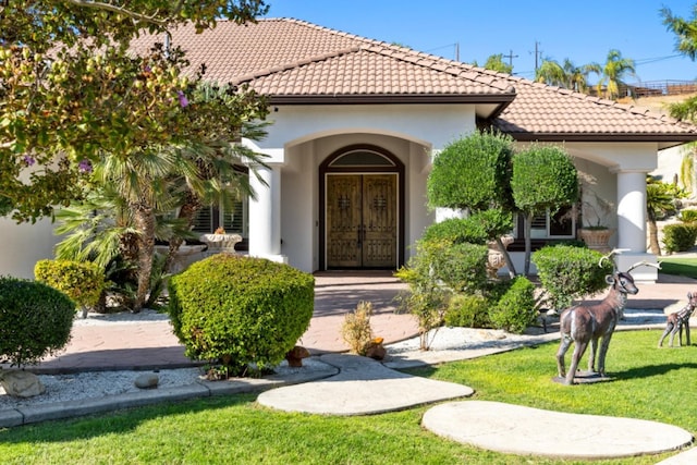 10834 Olcese Rd, Bakersfield, CA 93308 - view of exterior entry featuring a yard
