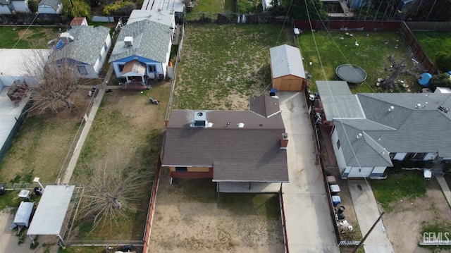 birds eye view of property with a residential view